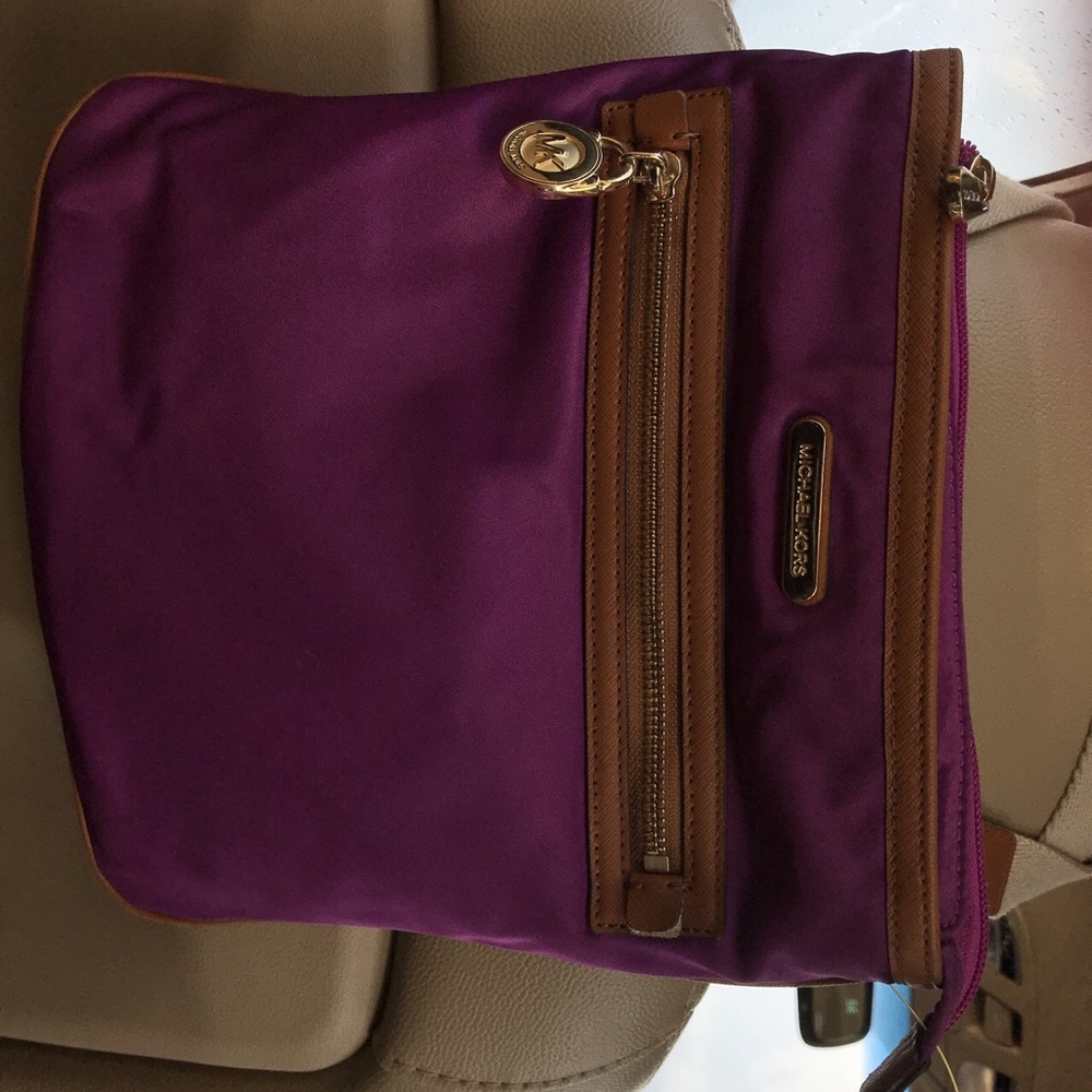 Purple/magenta? Michael Kors cross body